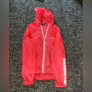 Small; Neon pink jacket; Very lightweight; Inside pocket